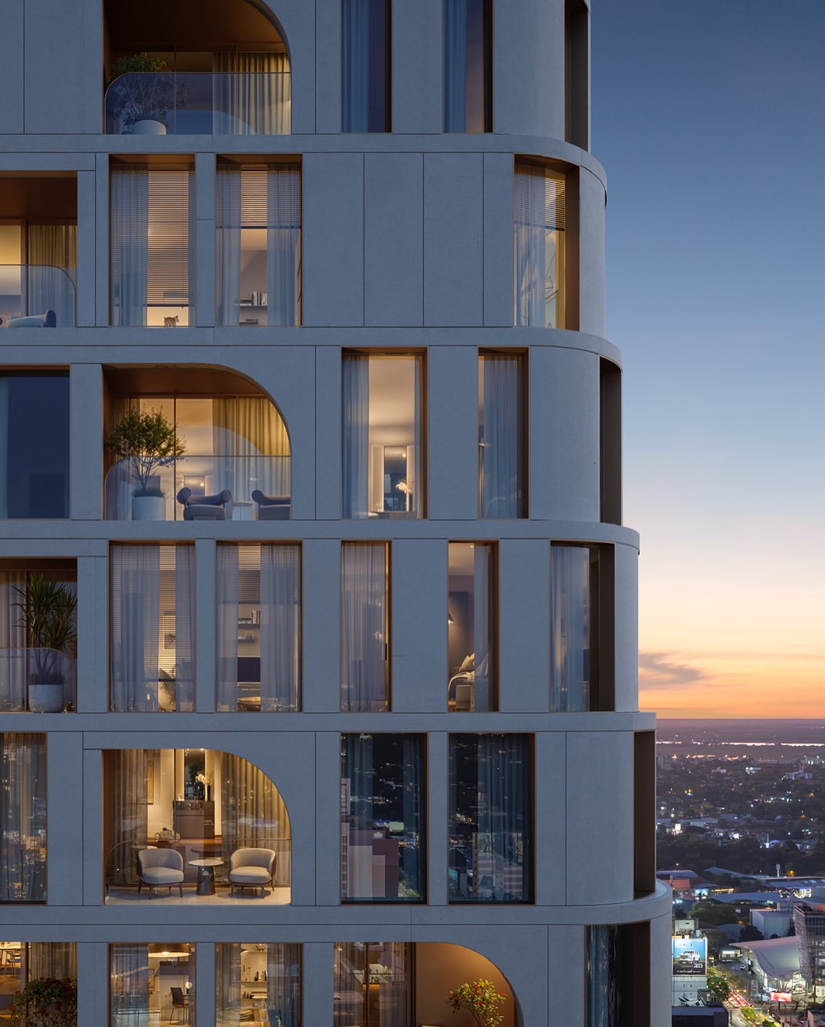 Fachada residencial do Royale e skyline de Assunção ao entardecer